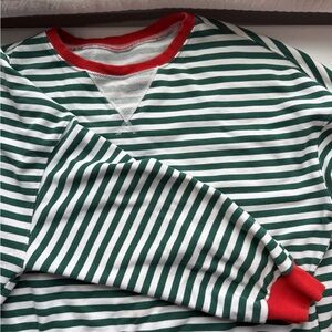 Green and White Striped Sweatshirt with Red Accents